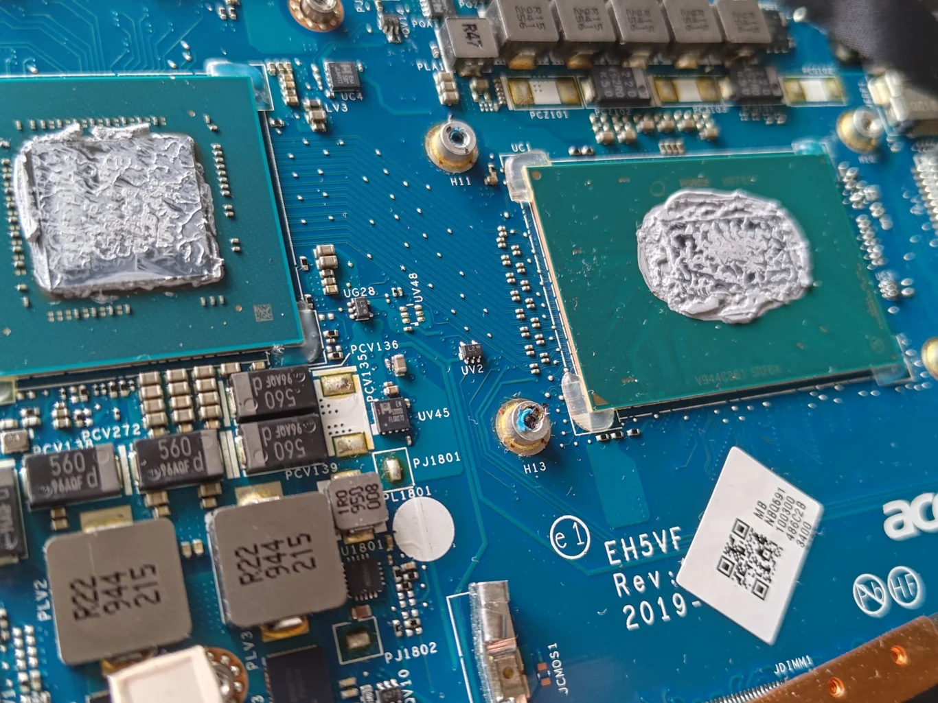Two Acer Nitro AN517-51 chip surfaces with old thermal compound after cooler removal