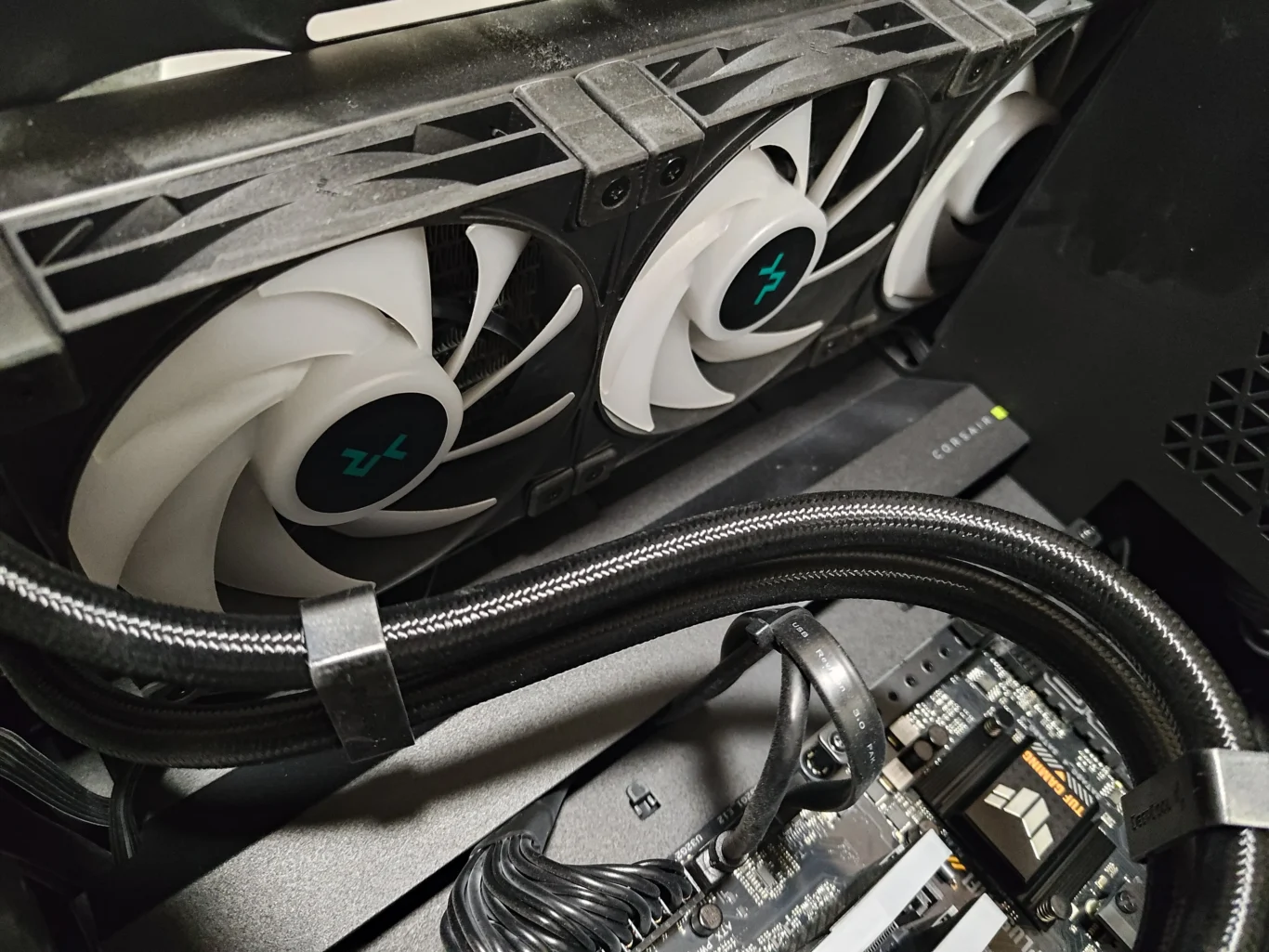 White radiator fans and liquid-cooler tubes in Intel desktop