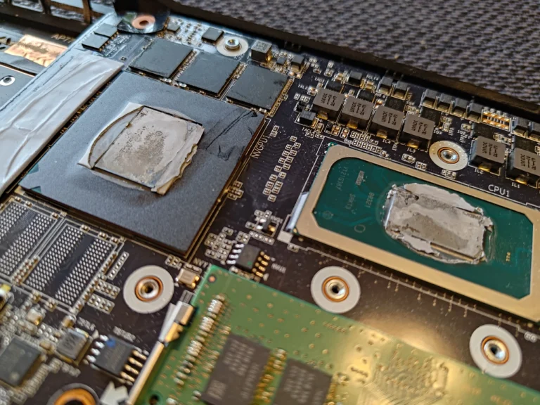 AORUS laptop chips with thermal paste after cooler removal