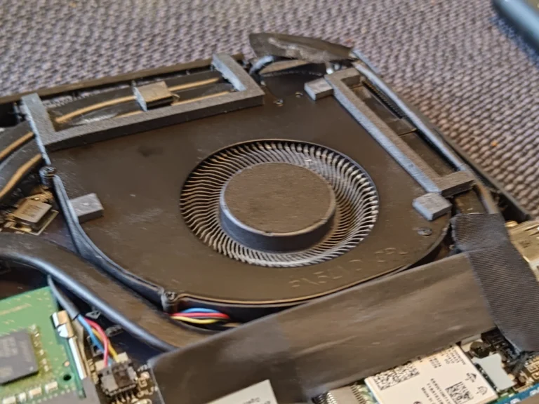 AORUS laptop blower removed for inspection of fan and outlet