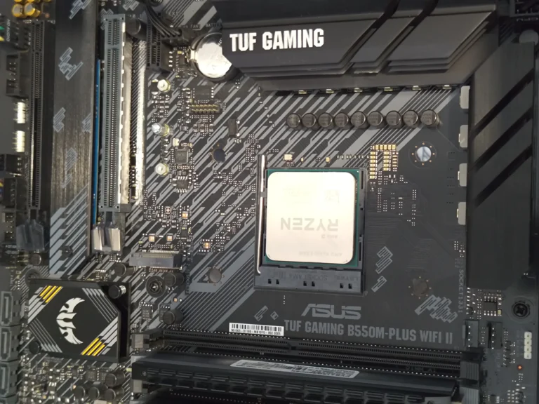 Ryzen processor on ASUS TUF Gaming motherboard during desktop cleaning