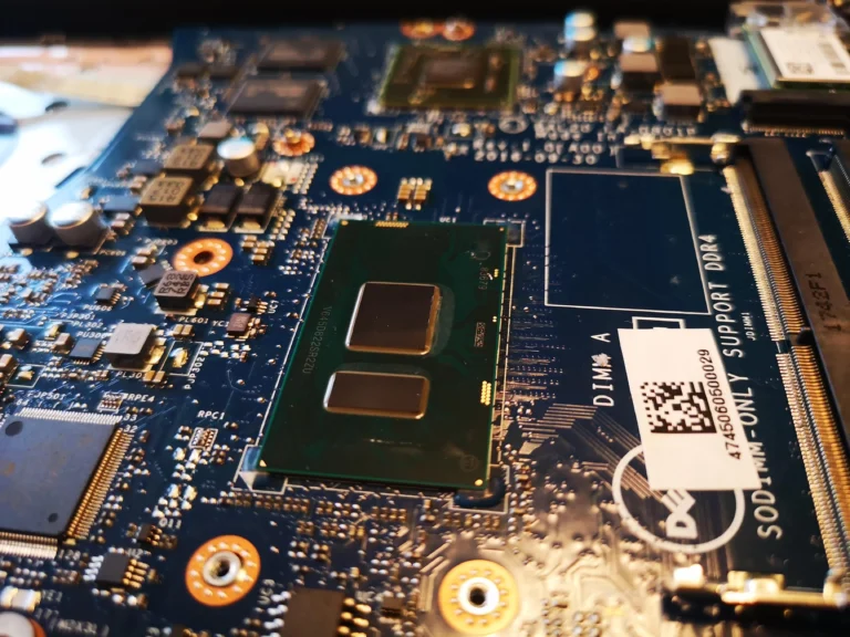 Exposed Dell Inspiron processor contact with old thermal compound