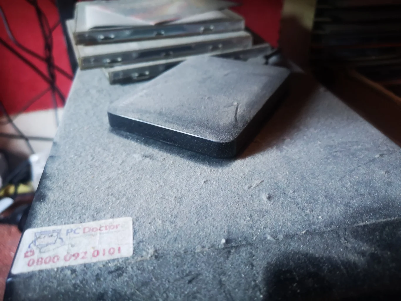 Thick dust layer covering the top of a desktop computer case
