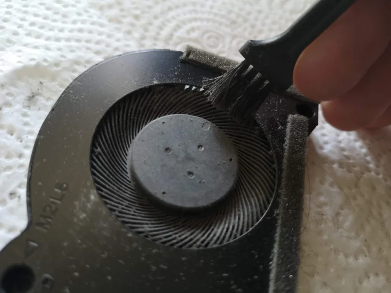 Brush cleaning the IdeaPad Gaming fan blade ring