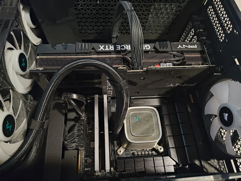Intel desktop with square AIO CPU pump block and PNY GeForce RTX graphics card