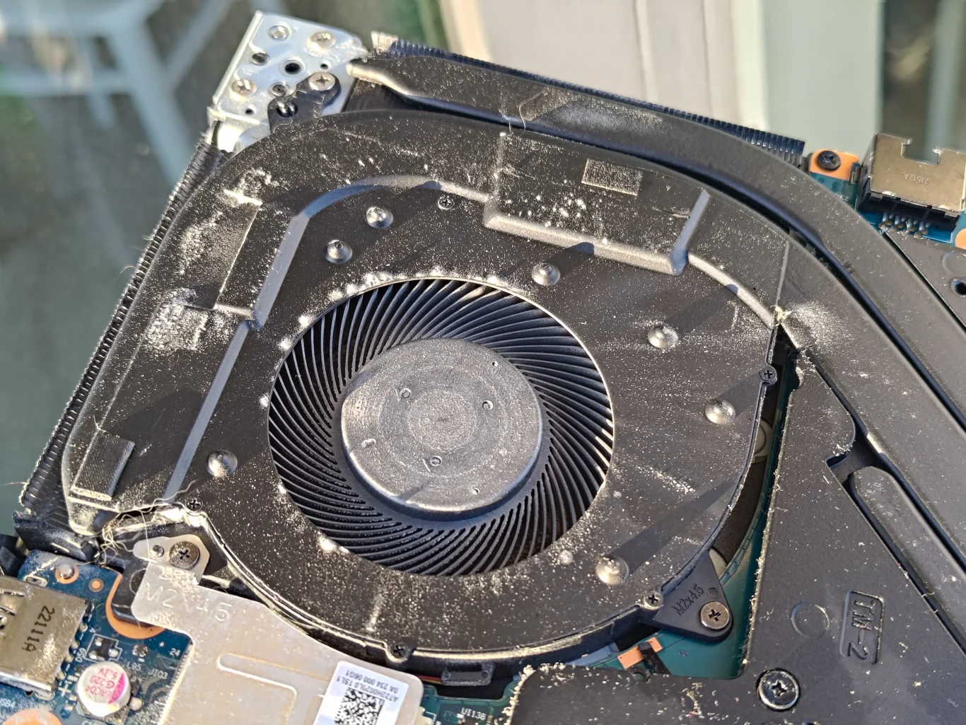 Dust on fan housing and inlet inside Lenovo Legion 5 15ACH6H