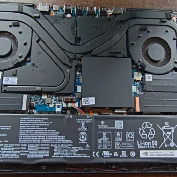 Lenovo Legion 5 Pro 16ITH6H open to show two fans, heat pipes and battery