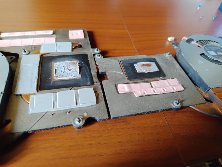 Underside of Legion 5 Pro heatsink showing chip plates and thermal pads