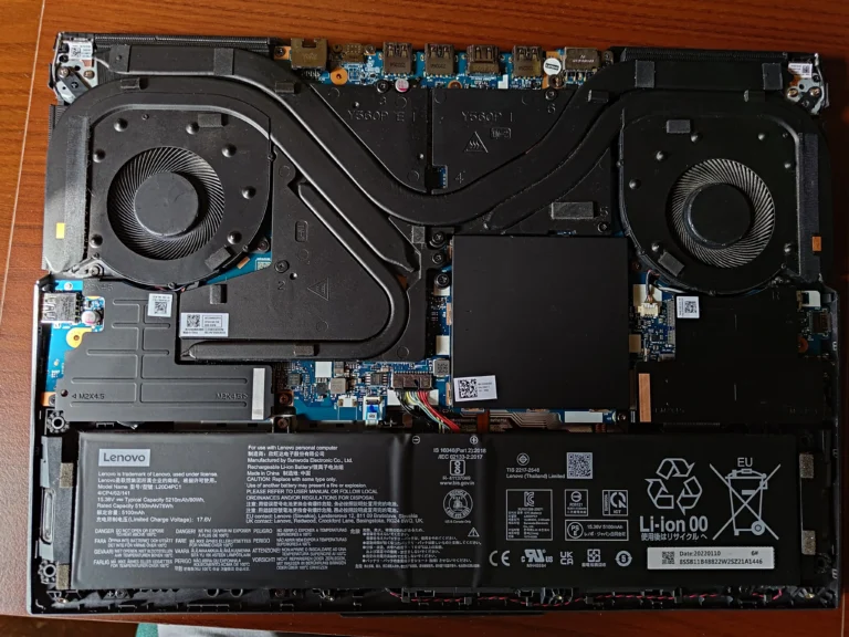 Open Lenovo Legion 5 Pro showing two fans and linked heat pipes