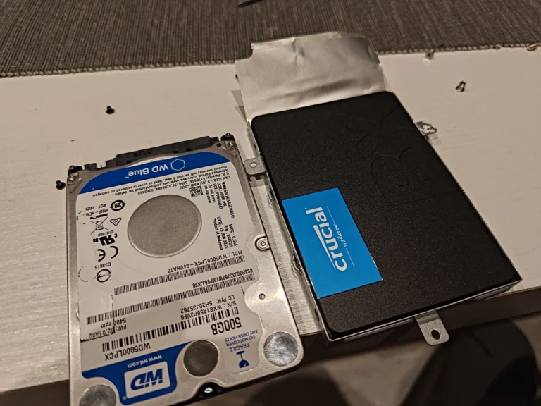 Crucial solid-state drive alongside original Western Digital laptop hard drive