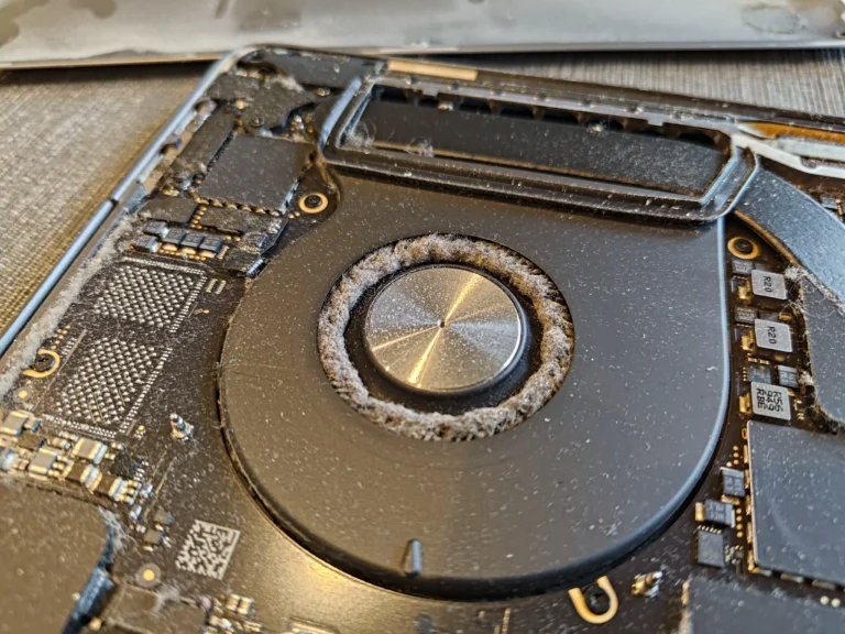 Thick dust ring around one MacBook Pro 16-inch cooling fan inlet