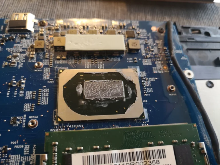 MSI GF63 processor exposed after cooler removal with old compound
