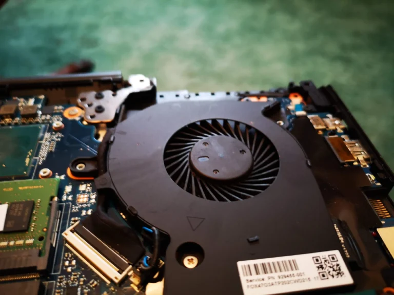 Razer gaming laptop fan with clearer dark blades after dust removal