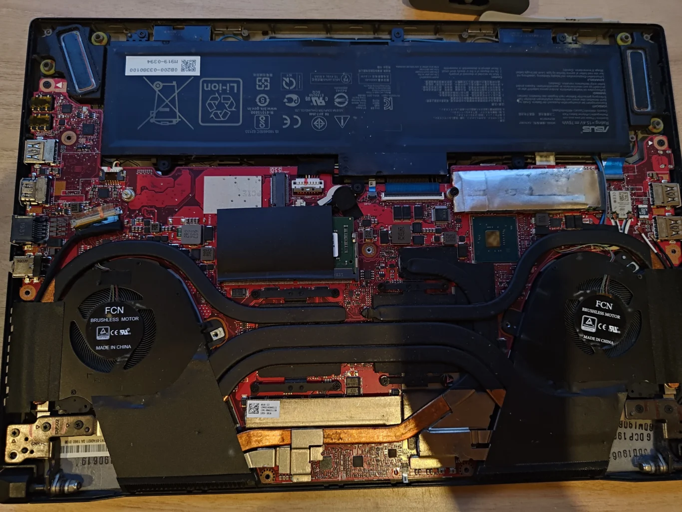 Open ROG Zephyrus GU502G showing two fans and connected cooling assembly