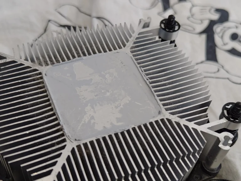 Old thermal material on underside of Ryzen desktop CPU cooler