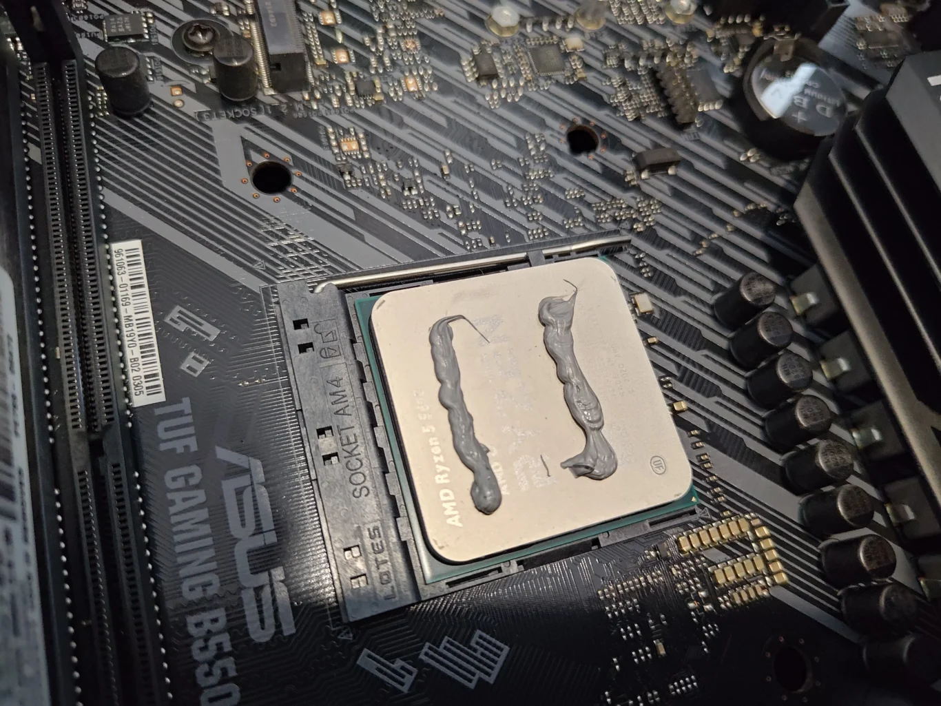 Old thermal compound on AMD Ryzen CPU after desktop cooler removal