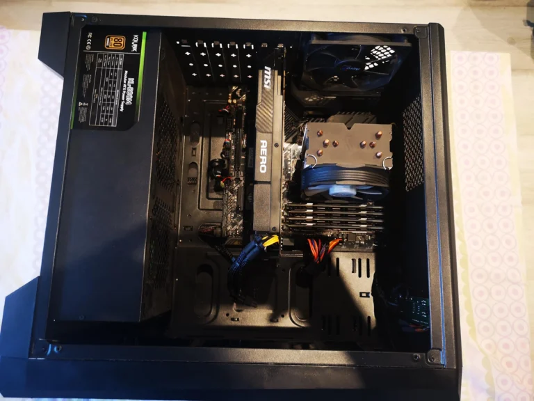 AMD Ryzen desktop interior with tower CPU cooler and MSI Aero graphics card